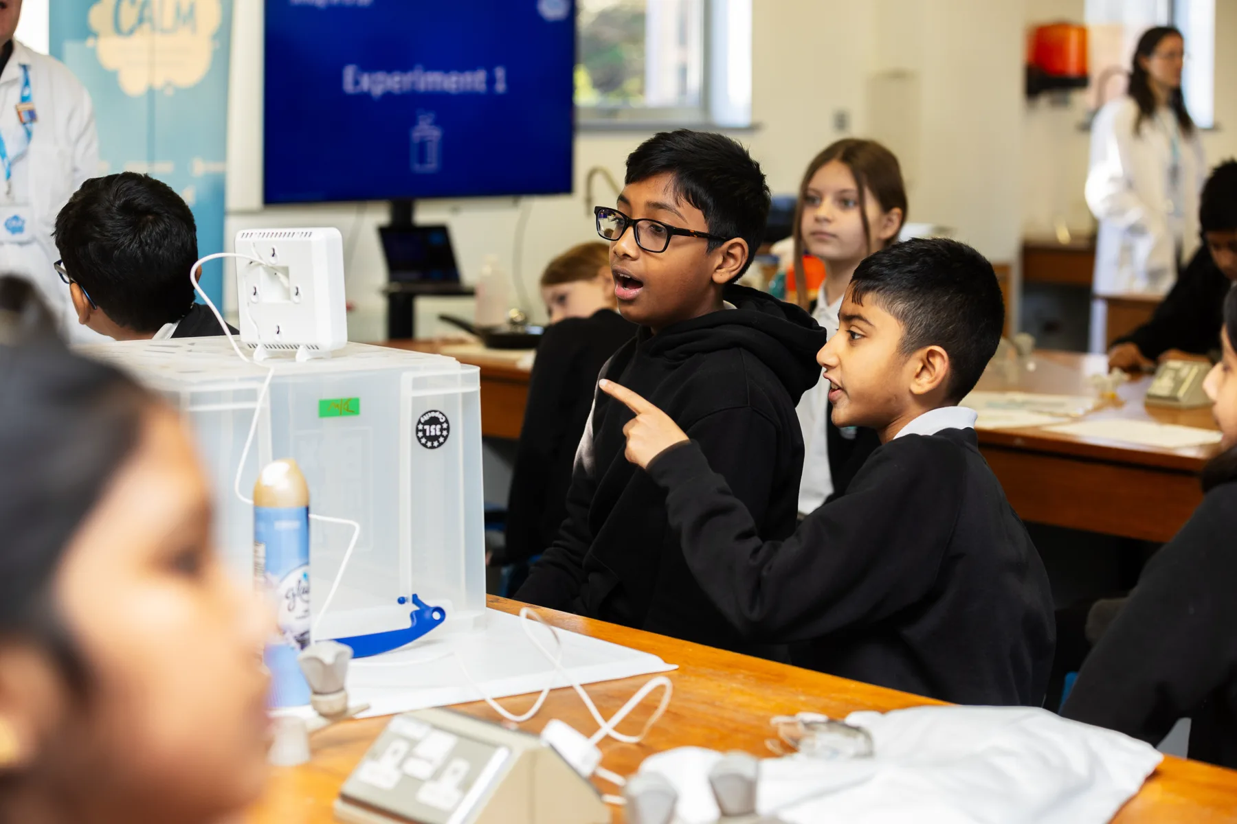 Students taking part in a practical science activity.